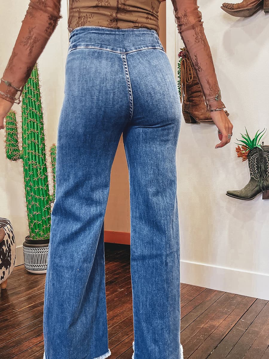 Jean slim taille haute uni déchiré tendance femme