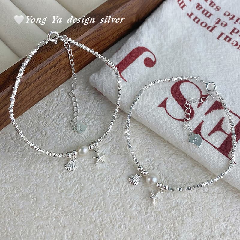 Bracelet en coquillage perforé