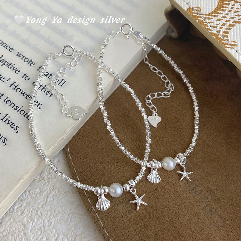 Bracelet en coquillage perforé